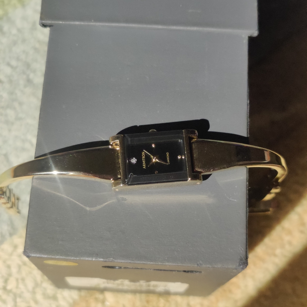 Armitron women's gold watch